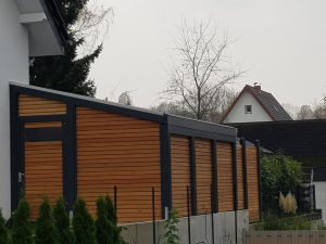 Abstellraum mit geschlossener Rhombusfassade mit Schattenfuge