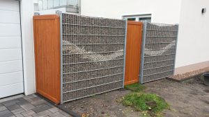 Holzzaun aus Lärche mit Gabionenwand